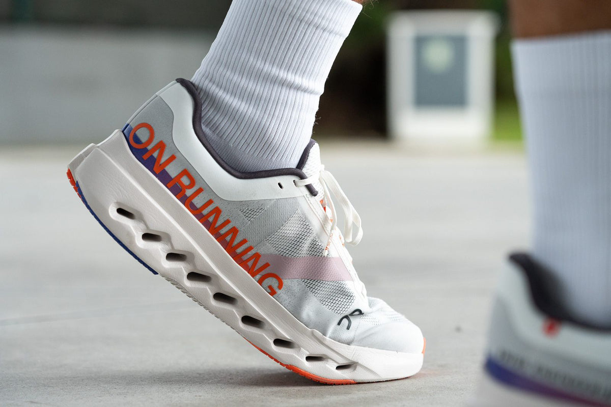 On Cloudsurfer Next white orange